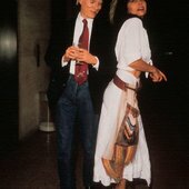 Ultra Violet and Andy Warhol stepping out in New York City, 1977